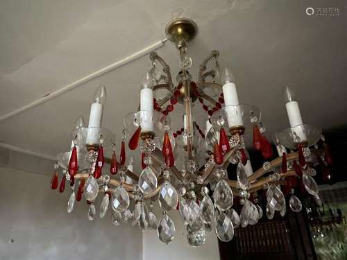 IMPORTANT 18 light brass chandelier decorated with…