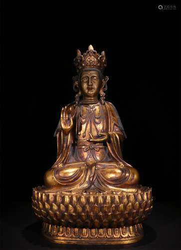 A MING DYNASTY BRONZE GILDED GUANYIN