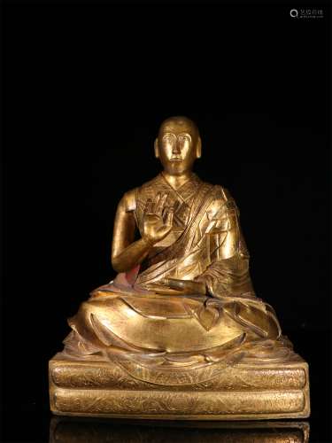 A MING DYNASTY BRONZE GILDED BUHDDA THE IMAGE OF THE MASTER