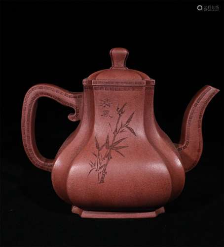 A QING DYNASTY PURPLE CLAY TEAPOT