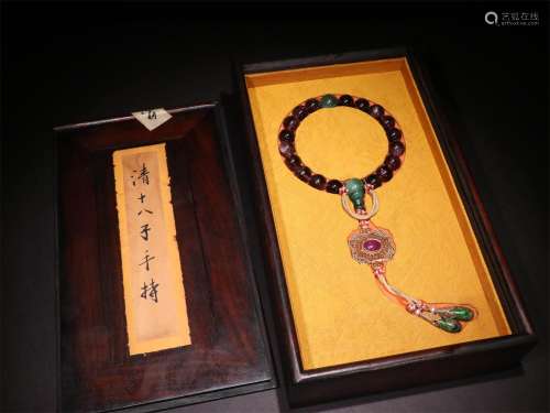 A QING DYNASTY EIGHTEEN BEADS HAND STRING