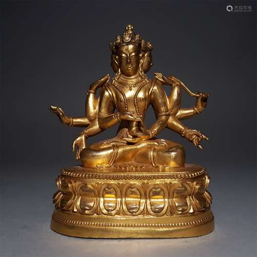 A MING DYNASTY BRONZE GILDED THOUSAND HANDS GUANYIN