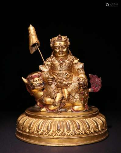 A QING DYNASTY BRONZE GILDED STATUE OF GOD OF WEALTH