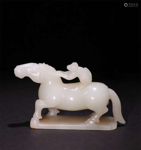 A QING DYNATY HETIAN JADE HORSE AND MONKEY ORNEMENT