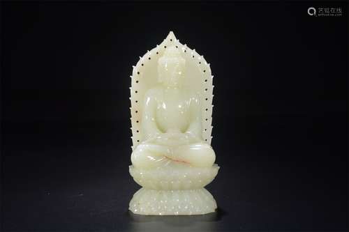 A QING DYNASTY HETIAN JADE AMITABHA STATUE