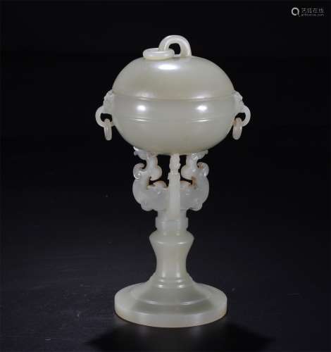 A QING DYNASTY HETIAN JADE CANDLESTICK