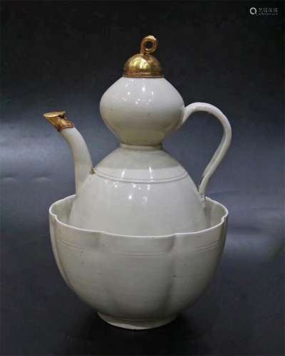A SONG DYNASTY DING KILN GOURD WRAPPED GOLD POT