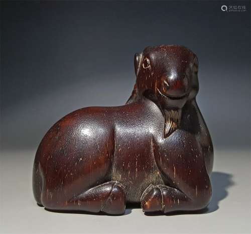 A QING DYNASTY HORN CARVING SHEEP