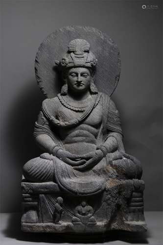 A BLACK STONE STATUE OF GANDHARA