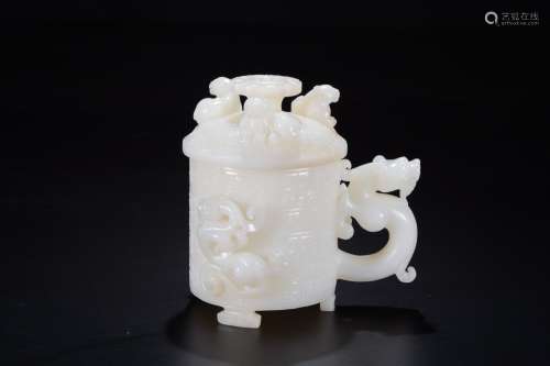 A QING DYNASTY HETIAN JADE CHI DRAGON COVERED CUP