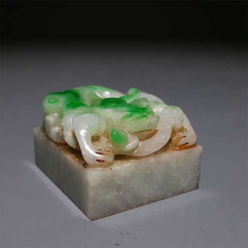 A QING DYNASTY JADEITE CHI DRAGON BUTTON SEAL