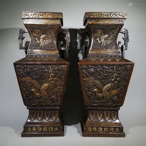 A PAIR OF QING QIANLONG DYNASTY BRONZE GILT PHOENIX DESIGN VASES