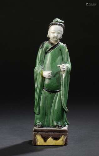 Statuette of figure in green, yellow and aubergine…