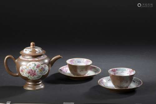 Teapot and pair of porcelain cups and saucers pink…