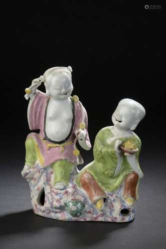 Group of two boys and pair of Qilin porcelain Pink…