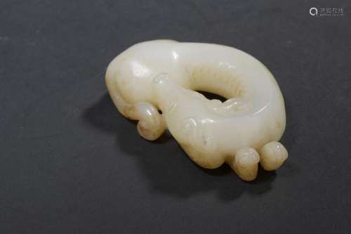 Dog in white jade and rust China Shown coiled. L. …