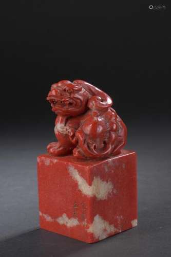 Red soapstone seal China The carved grip of a seat…