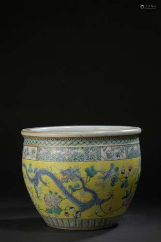 Polychrome porcelain fish bowl with yellow backgro…