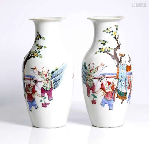 A pair of Chinese porcelain vases, depicting young boys. Republic period