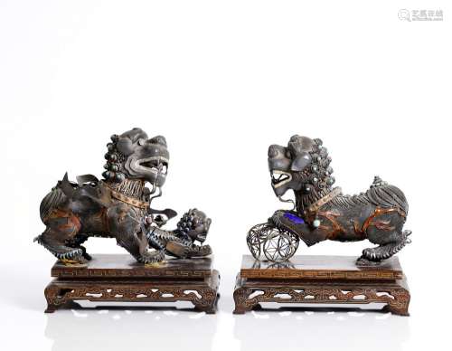 a pair of antique , fine Chinese silver gilded filigree lions.