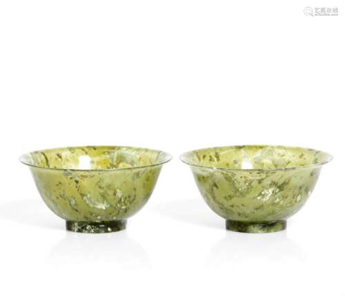 a pair of rare antique Chinese jade tea cups.