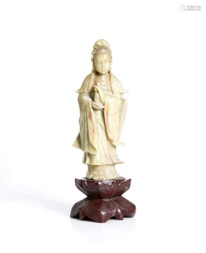 an antique, Chinese, soapstone Guanyin.