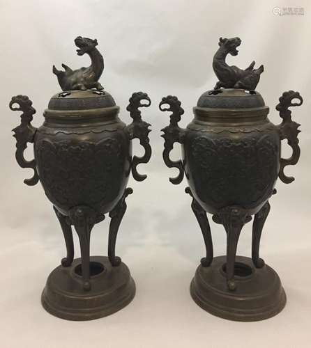 Pair of bronze tripod burners with a beautiful lig…