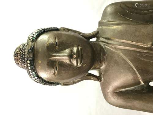 An important bronze Buddha with a brown patina, si…