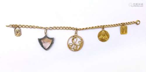 BRACELET en or jaune 18K retenant 5 cing charmed (…