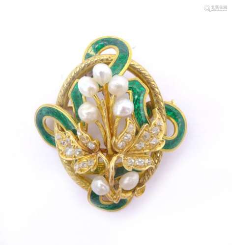 BROCHE en or jaune 18K présentant une gerbe de fle…