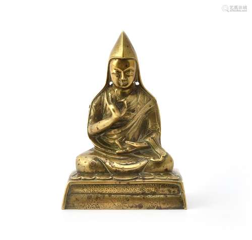 A Sino-Tibetan gilt-bronze seated figure of Tsong Ka Pa