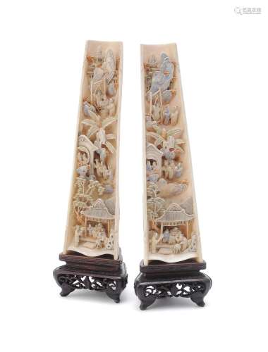 Y A pair of Chinese stained ivory wrist rests