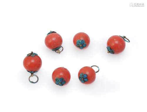 A rare set of six glass coral-coloured robe buttons