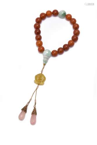 A string of amber and jadeite rosary beads