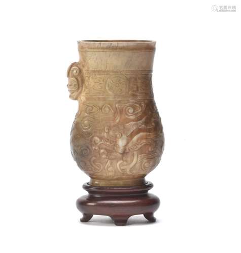 A Chinese 'Chicken bone' jade pouring vessel