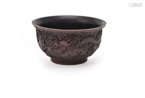 A Chinese carved red and black lacquer 'Dragon' bowl