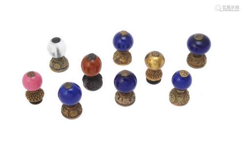 A Collection of nine Chinese hat finials