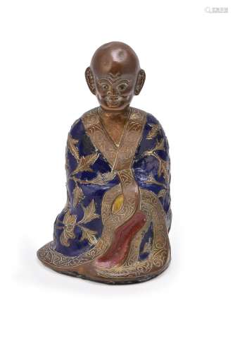 A Chinese gilt bronze and champlevé enamel figure of luohan