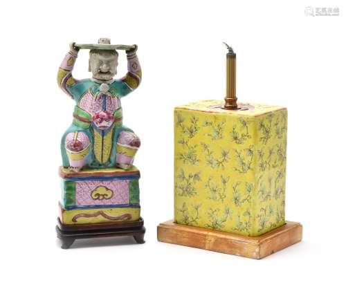 A Chinese Export 'Famille Rose' figural pricket-stick