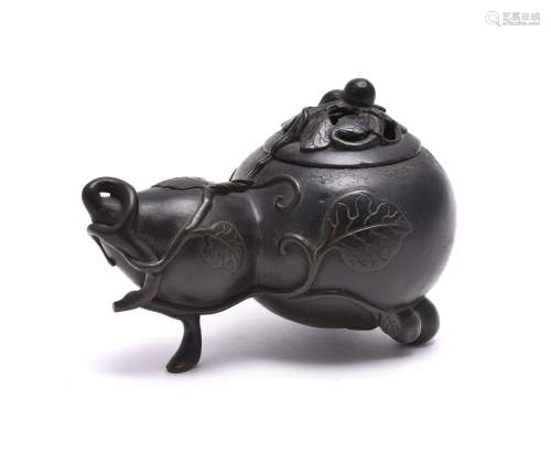 A Chinese bronze double-gourd shaped censer and cover