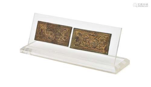 A pair of gilt-bronze rectangular belt plaques