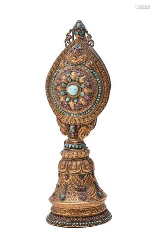 A copper gilt repoussé Buddhist altar ornament