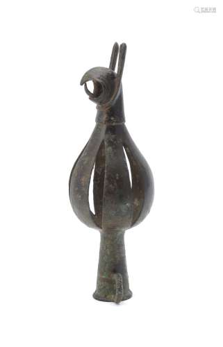 A bronze terminal with a griffin head