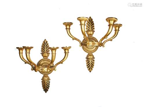 A pair of French gilt bronze four light wall appliques in Charles X taste