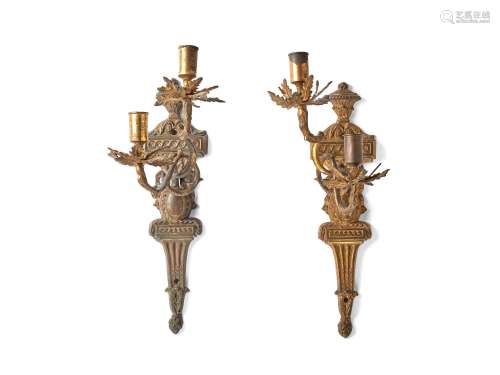 A pair of Northern European gilt brass twin light wall appliques