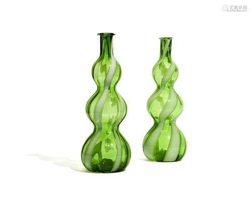 A pair of Italian green triple gourd glass vases