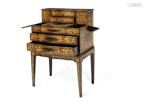 A Chinese Export black lacquer and gilt chinoiserie decorate dressing table