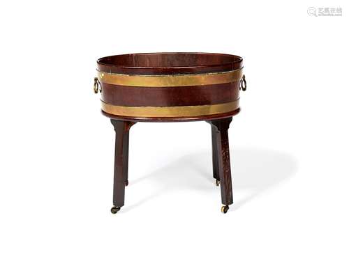 A George III mahogany and brass bound wine cooler