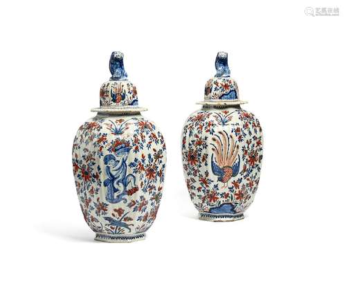 A large pair of Delft vases and covers