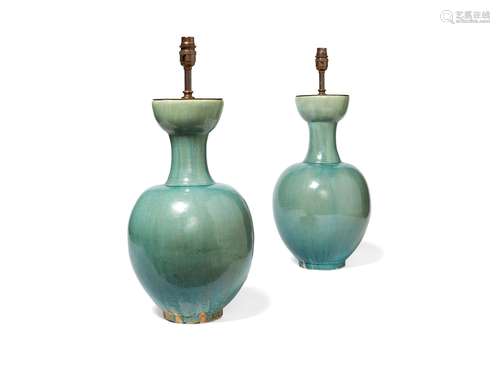 A pair of Chinese turquoise glazed pottery baluster vases fitted as table lamps